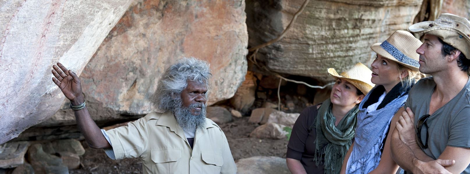 Viewing aboriginal rock art with tour guide Tommo in Arnhem Land