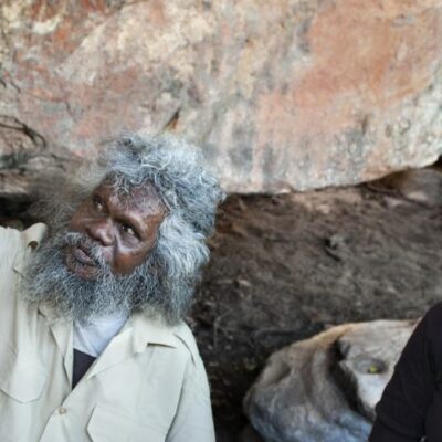 Viewing aboriginal rock art with tour guide Tommo in Arnhem Land